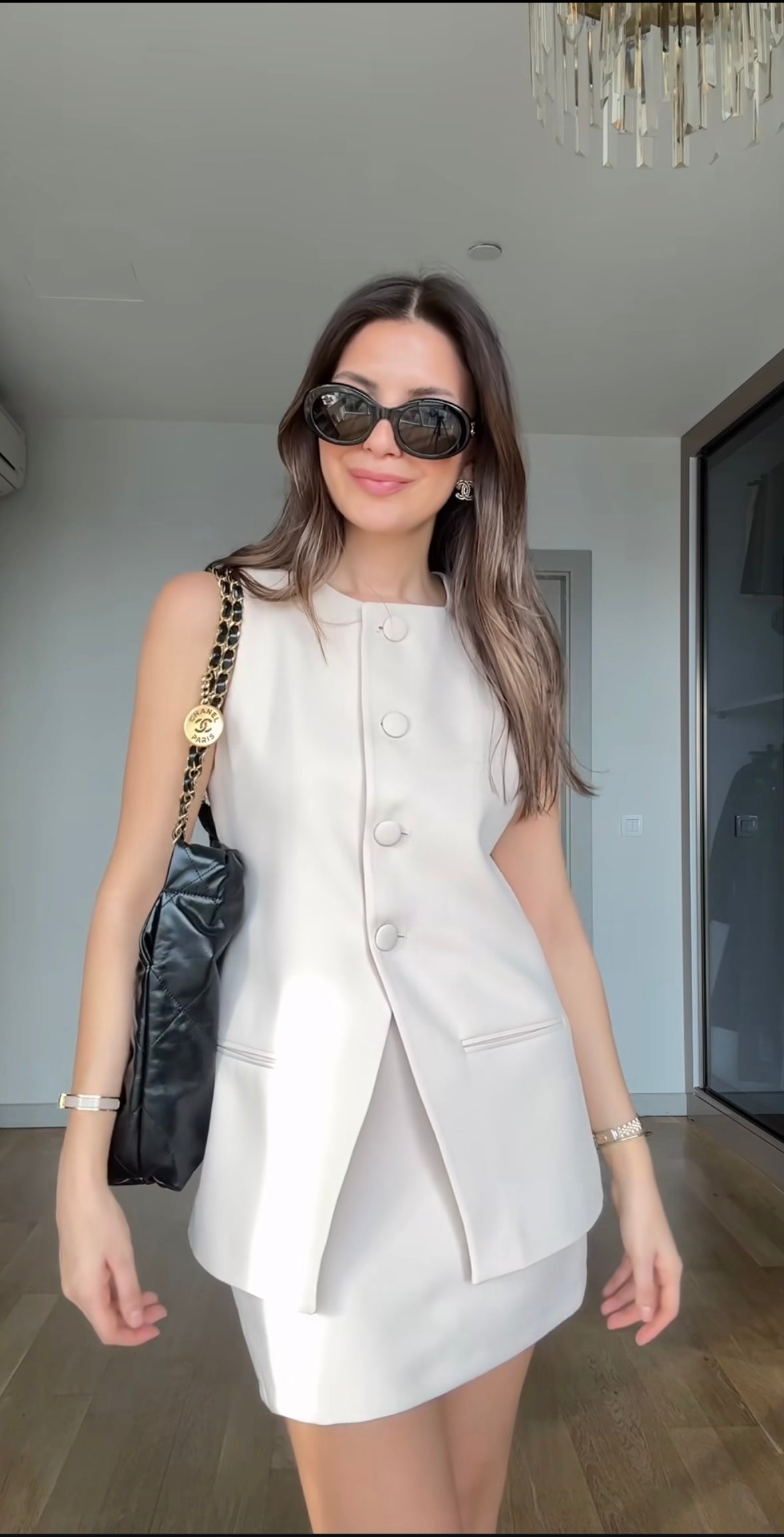 Sleeveless blazer and skirt/shorts set