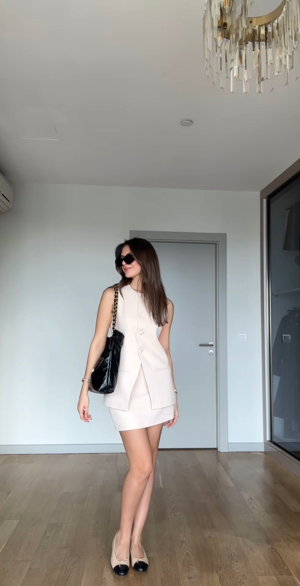 Sleeveless blazer and skirt/shorts set