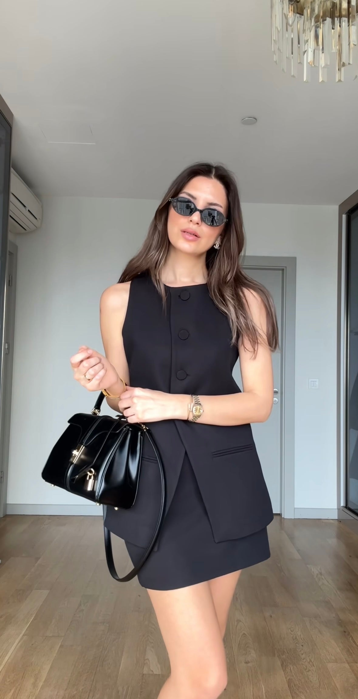 Sleeveless blazer and skirt/shorts set