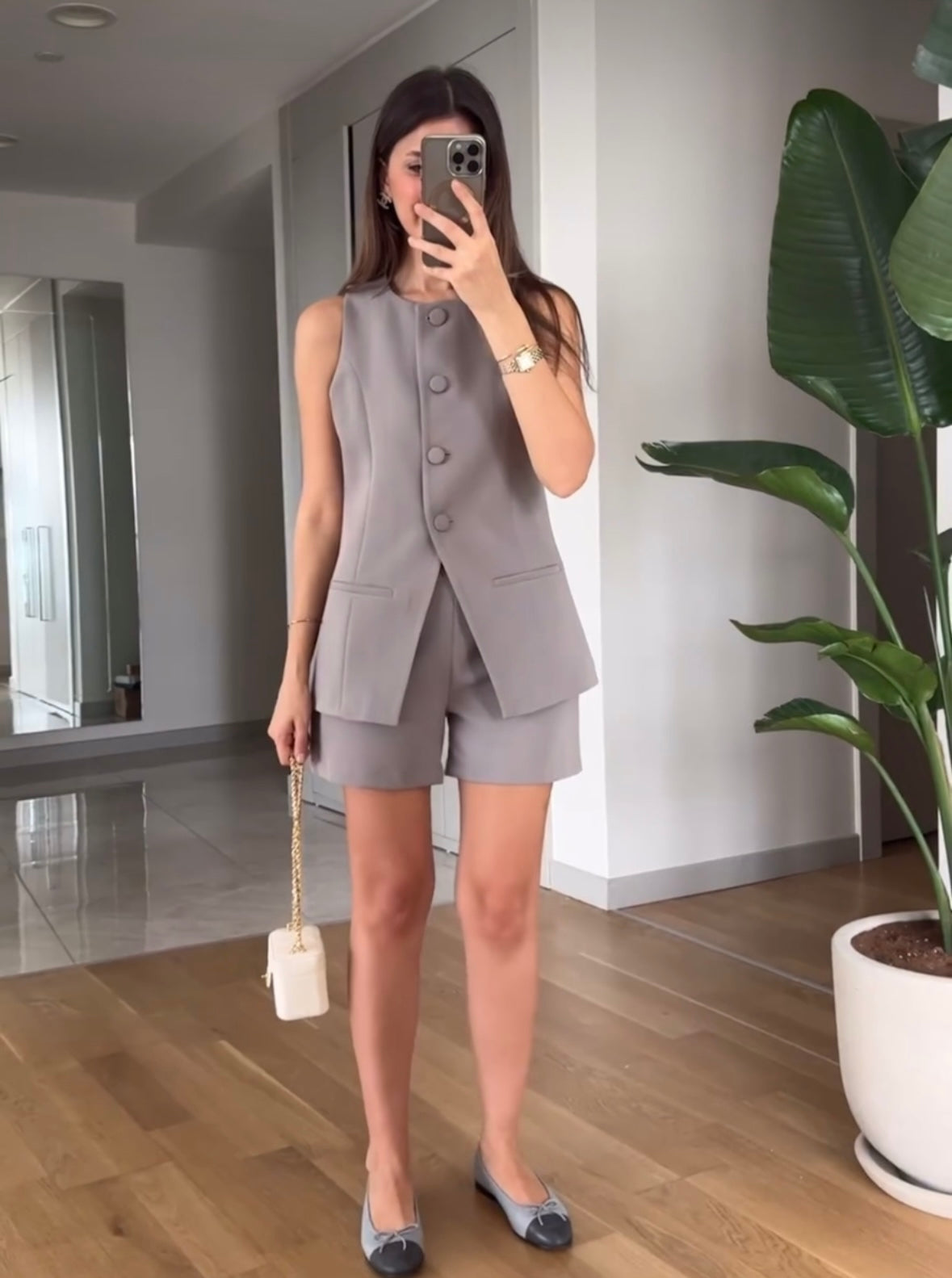 Sleeveless blazer and skirt/shorts set