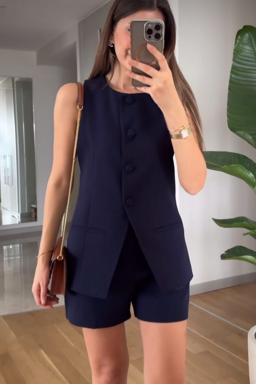Sleeveless blazer and skirt/shorts set