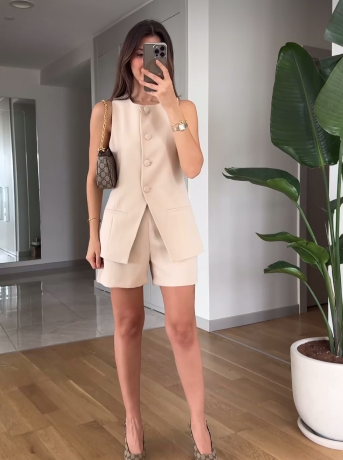Sleeveless blazer and skirt/shorts set
