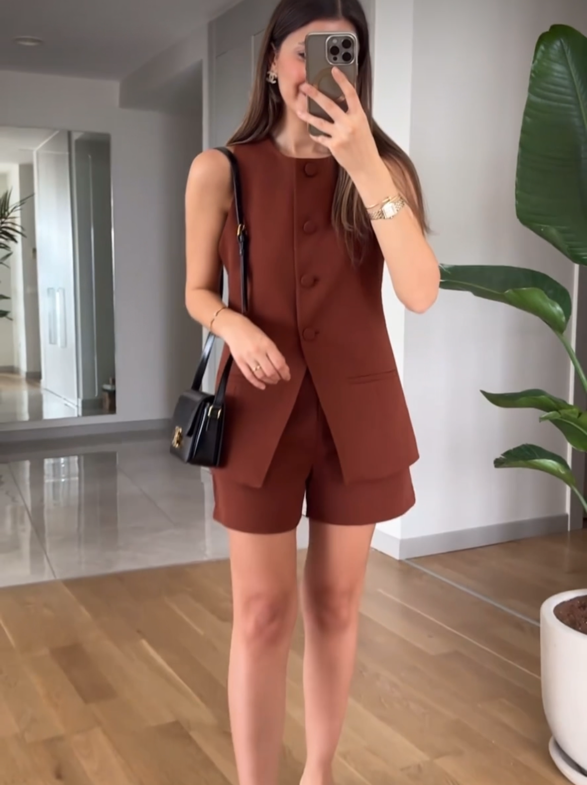 Sleeveless blazer and skirt/shorts set