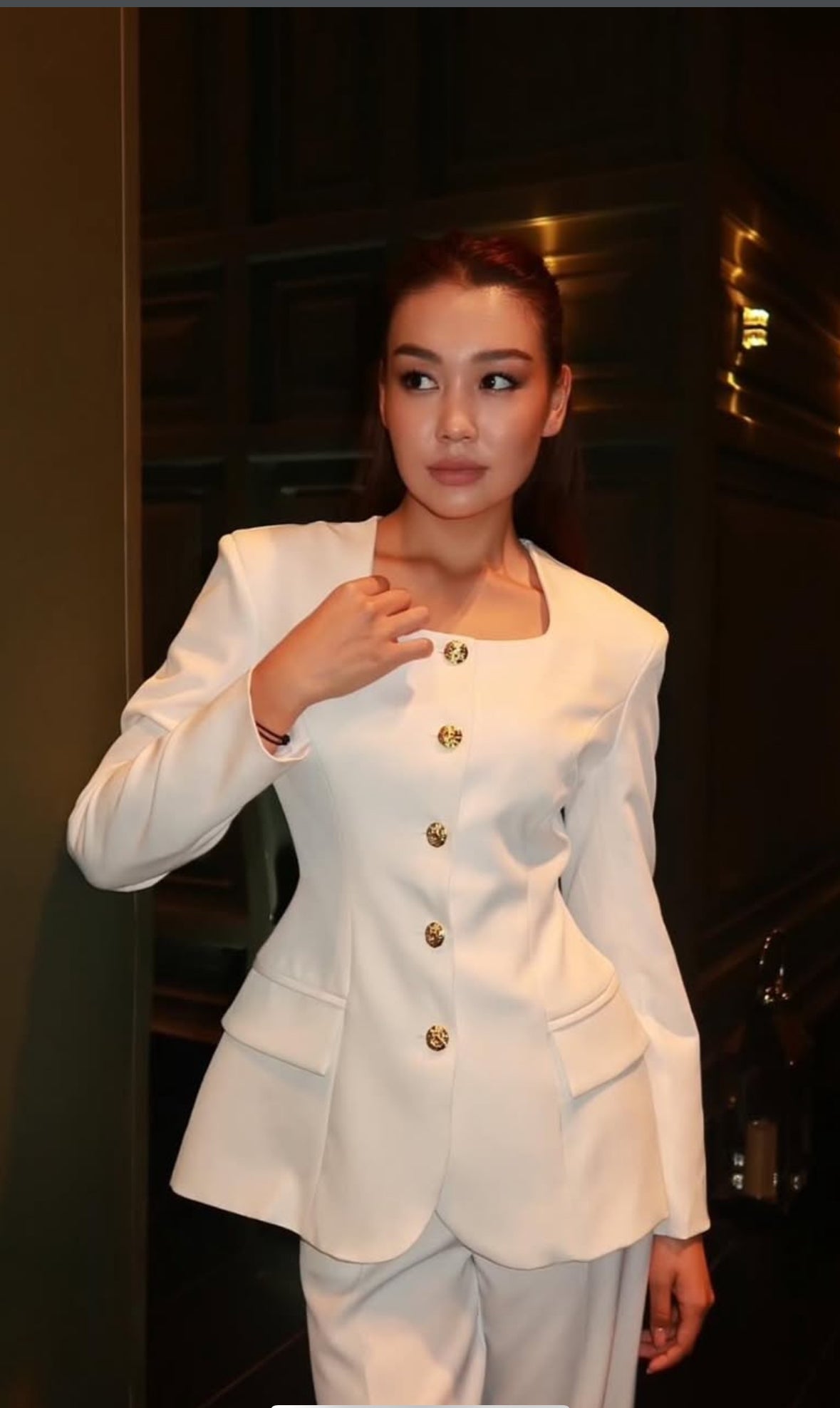 Golden buttoned suit