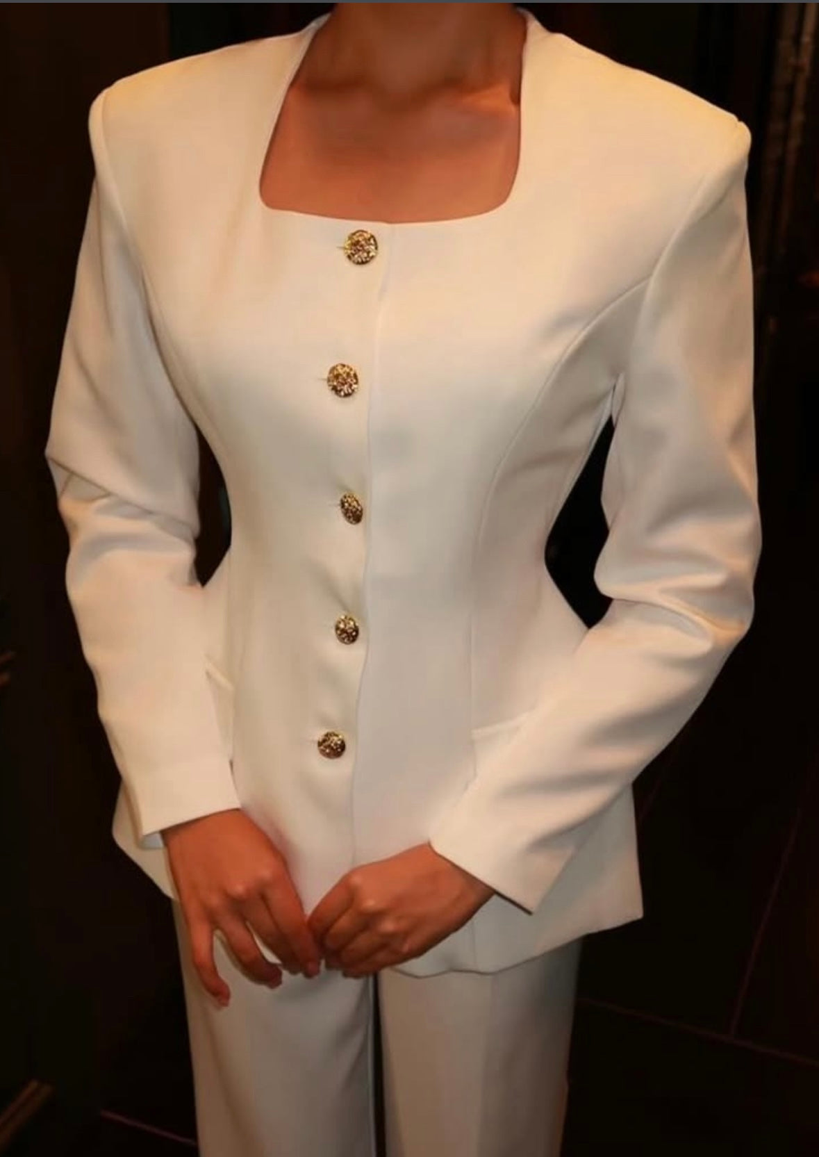 Golden buttoned suit